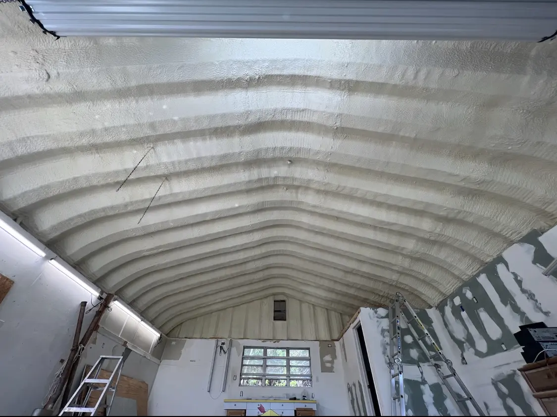 Spray polyurethane foam applied to the underside of a metal roof deck in Eastampton